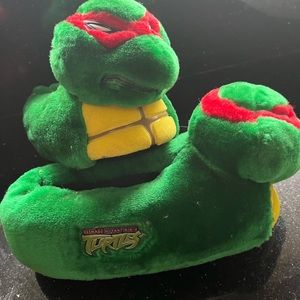 Teenage Mutant Ninja Turtle slippers.  Big kid size medium 2/3.